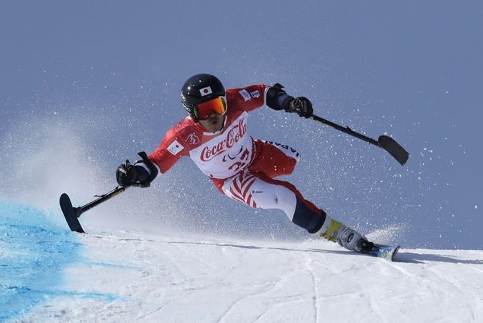 Japan’s Hiraku Misawa competes at the 2018 Winter Paralympics in South Korea, on March 11, 2018. See more photos from other events <a href="https://www.theatlantic.com/photo/2018/03/photos-of-the-2018-winter-paralympics/555497/" rel="nofollow noopener" target="_blank" data-ylk="slk:here.;elm:context_link;itc:0;sec:content-canvas" class="link ">here.</a> (Lee Jin-man / AP)