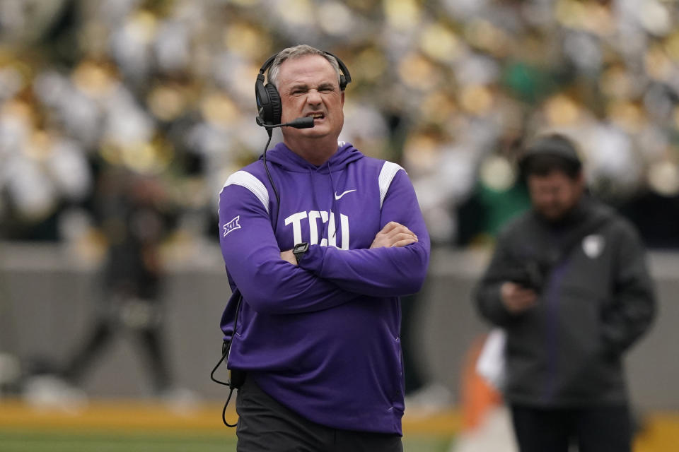 TCU head coach Sonny Dykes walks the sidelines during the first half of an NCAA college football against TCU in Waco, Texas, Saturday, Nov. 19, 2022. (AP Photo/LM Otero)