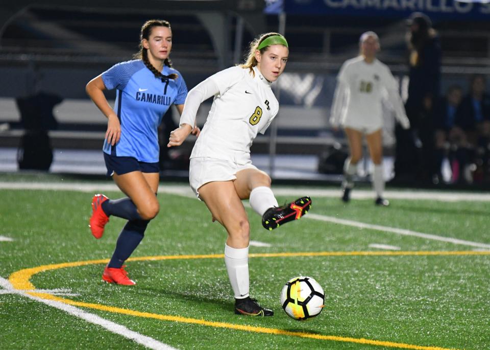 Oak Park's Ava Dermott makes a pass during the Eagles' 3-0 win over Camarillo in a Coastal Canyon League match on Monday night.