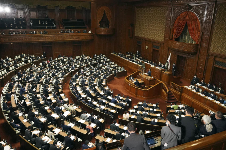 Japanese Prime Minister Fumio Kishida speaks during a Diet session at the Lower House of the Parliament on Monday, Jan. 23, 2023, in Tokyo. Kishida said Monday that Japan faces the severest security environment in the region since the end of World War II and pledged to push a military buildup under a newly adopted security strategy over the next five years and beyond as well as tackle rapidly declining births so the country can sustain national strength. (AP Photo/Eugene Hoshiko)