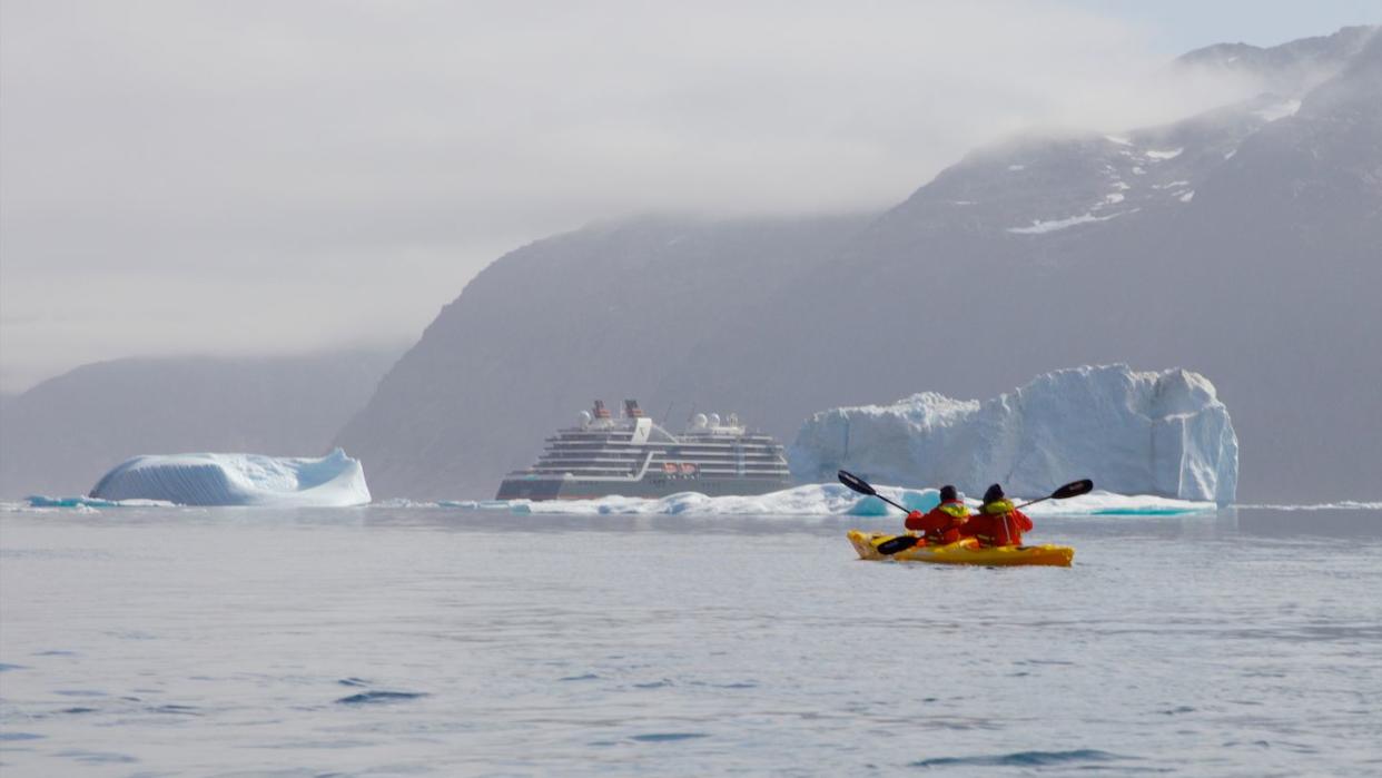 kayakers from luxury expedition ship seabourn venture's cruise around greenland