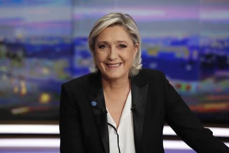 Marine Le Pen, French National Front (FN) political party leader and candidate for French 2017 presidential election, poses prior to an interview on the prime time evening news broadcast of French TV channel TF1, in Boulogne-Billancourt, near Paris, France, February 22, 2017. REUTERS/Patrick Kovarik/Pool