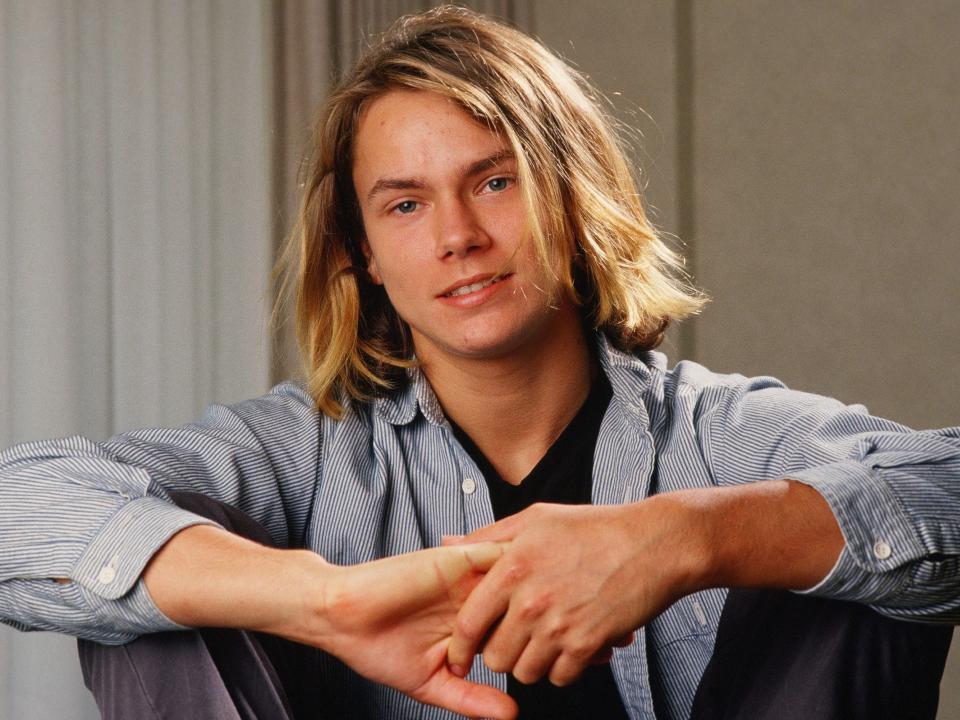 River Phoenix poses during a 1988 photo portrait session inLos Angeles, California.