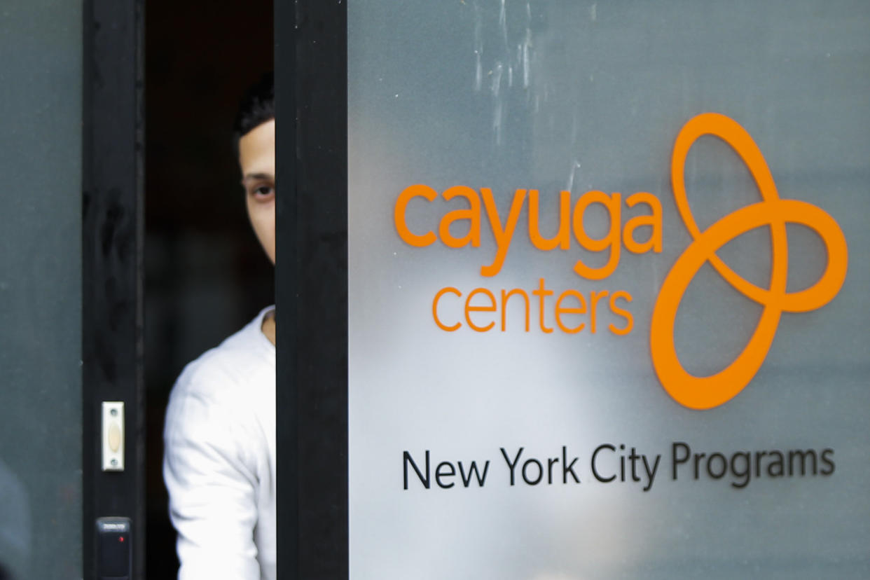 A person exits the Cayuga Centers branch on June 22 in New York City. More than 239 migrant children who were separated from their parents and relatives at the U.S.-Mexico border are under Cayuga Centers care in New York. (Photo: VIEW press via Getty Images)