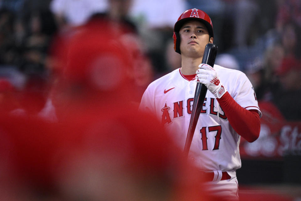 Aug 23, 2023; Anaheim, California, USA; Los Angeles Angels designated hitter Shohei Ohtani (17) looks on from the on-deck circle during the second inning against the Cincinnati Reds at Angel Stadium. Mandatory Credit: Orlando Ramirez-USA TODAY Sports