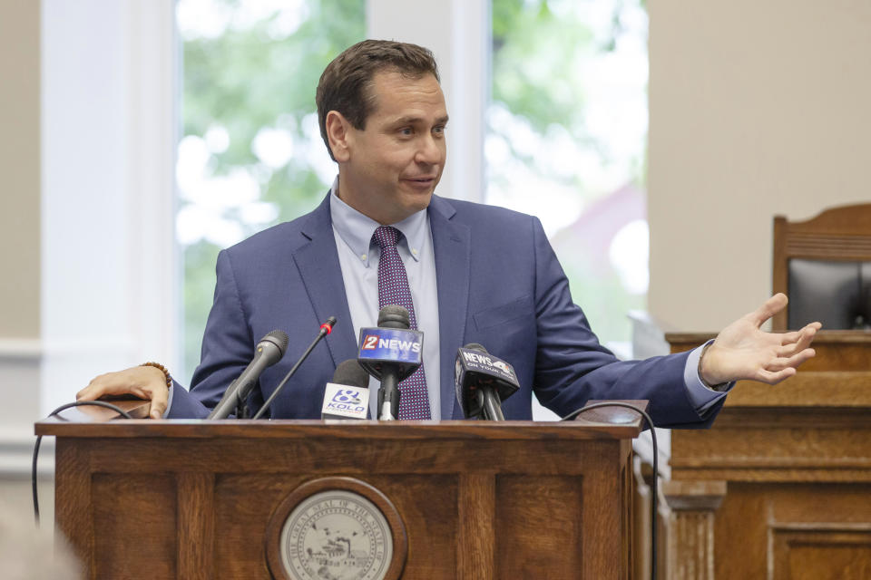 Nevada Secretary of State Cisco Aguilar speaks before Governor Joe Lombardo signs an election worker protection bill into law as Secretary of State Cisco Aguilar looks on at the old Assembly Chambers in Carson City, Nev., Tuesday, May 30, 2023. (AP Photo/Tom R. Smedes)