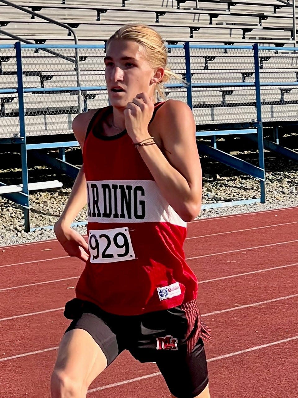 Marion Harding's Carter Ferguson runs to the finish at the Ridgedale Rocket Cross Country Run earlier this year. He won the Mid Ohio Athletic Conference championship on Saturday.