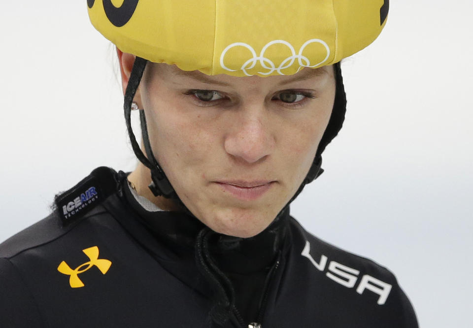 Emily Scott of the United States practices during a short track speedskating practice session at the Iceberg Skating Palace during the 2014 Winter Olympics, Friday, Feb. 14, 2014, in Sochi, Russia. Scott has overcome money troubles and family strife to realize her goal of competing in the Olympics. Along the way, the 24-year-old short track skater from Springfield, Mo., has picked up hundreds of fans who shelled out as little as $5 to help her stay in training. (AP Photo/Darron Cummings)