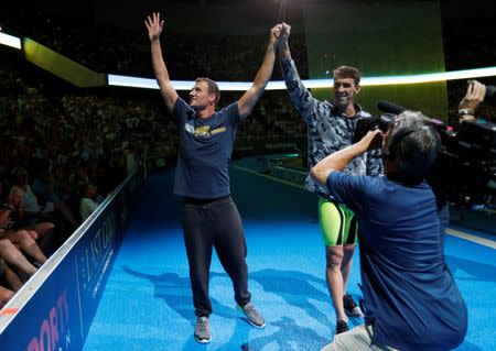 Jul 1, 2016; Omaha, NE, USA; Michael Phelps (right) and Ryan Lochte react during the U.S. Olympic swimming team trials at CenturyLink Center. Mandatory Credit: Erich Schlegel-USA TODAY Sports