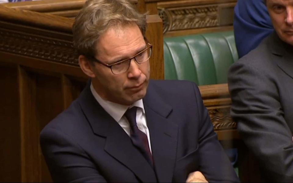 Conservative MP Tobias Ellwood looks on as Prime Minister Theresa May speaks to MPs - Credit: PA