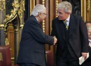The President of Singapore Tony Tan (L) shakes hands with Speaker of the House of Commons John Bercow, before his speech to parliamentarians, in the Royal Robing Room at the Palace of Westminster, central London October 21, 2014. The President of Singapore Tony Tan and his wife Mary Chee started a four day state visit to Britain on Tuesday. REUTERS/Luke MacGregor (BRITAIN - Tags: POLITICS)