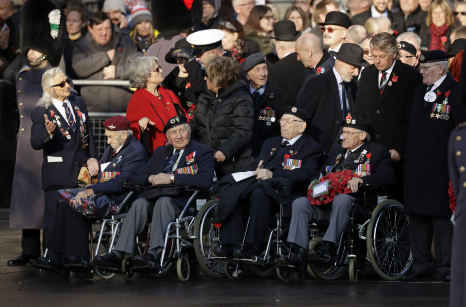 Military veterans arrive for the Remembrance Sunday ceremony at the Cenotaph in Whitehall in London, Sunday, Nov. 10, 2019. Remembrance Sunday is held each year to commemorate the service men and women who fought in past military conflicts. (AP Photo/Matt Dunham)