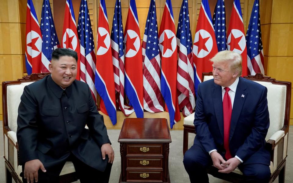 U.S. President Donald Trump meets with North Korean leader Kim Jong Un at the demilitarized zone separating the two Koreas, in Panmunjom, South Korea, June 30, 2019 - Reuters