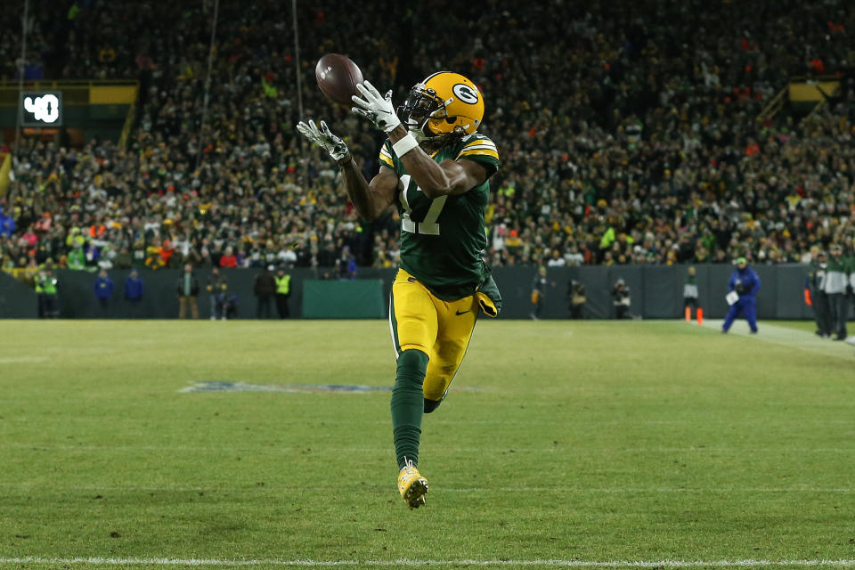 GREEN BAY, WISCONSIN - JANUARY 12: Davante Adams #17 of the Green Bay Packers makes a touchdown catch against the Seattle Seahawks in the first quarter of the NFC Divisional Playoff game at Lambeau Field on January 12, 2020 in Green Bay, Wisconsin. (Photo by Dylan Buell/Getty Images)