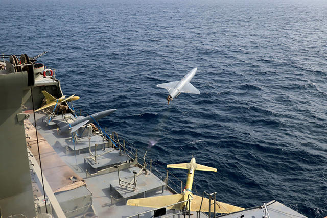 FILE - In this photo released by the Iranian Army on Aug. 25, 2022, a drone is launched from a warship in a military drone drill in Iran. The Iranian-made drones that Russia sent slamming into central Kyiv this week have produced hand-wringing and consternation in Israel, complicating the country’s balancing act between Russia and the West. (Iranian Army via AP)