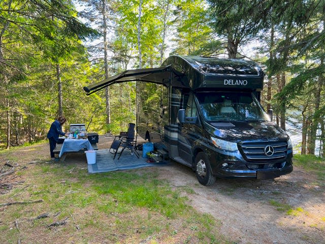 Their chariot into adventure: A Thor Delano. Essentially a 7-foot wide, 11-foot-tall box bolted onto a Mercedes Sprinter van. Keep the manual handy. Packing up and backing up are not for the faint of heart.