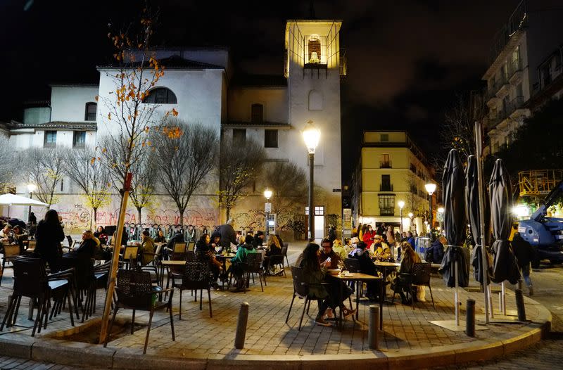 People sit on a terrace amid the coronavirus disease (COVID-19) pandemic in Madrid