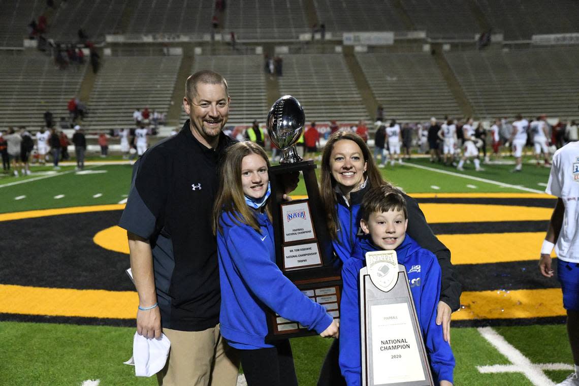 Chris Oliver celebrated Lindsey Wilson’s 45-13 2020 NAIA national championship game victory over Northwestern College with his family, wife Wendy; daughter Samantha; and son Patrick.