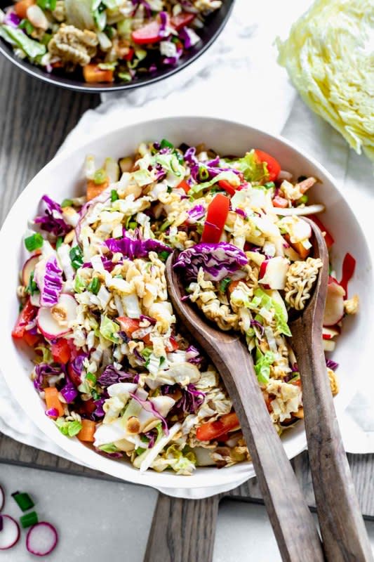 <p>Healthy Seasonal Recipes</p><p> This simple chilled salad with carrots, scallions and toasted almonds is made with crunchy uncooked ramen noodles, Napa cabbage and an easy, Asian-inspired soy sesame dressing.</p><p><strong>Get the recipe:</strong> <a href="https://www.healthyseasonalrecipes.com/napa-cabbage-ramen-noodle-salad/" rel="nofollow noopener" target="_blank" data-ylk="slk:Napa Cabbage Ramen Noodle Salad;elm:context_link;itc:0;sec:content-canvas" class="link ">Napa Cabbage Ramen Noodle Salad </a></p>