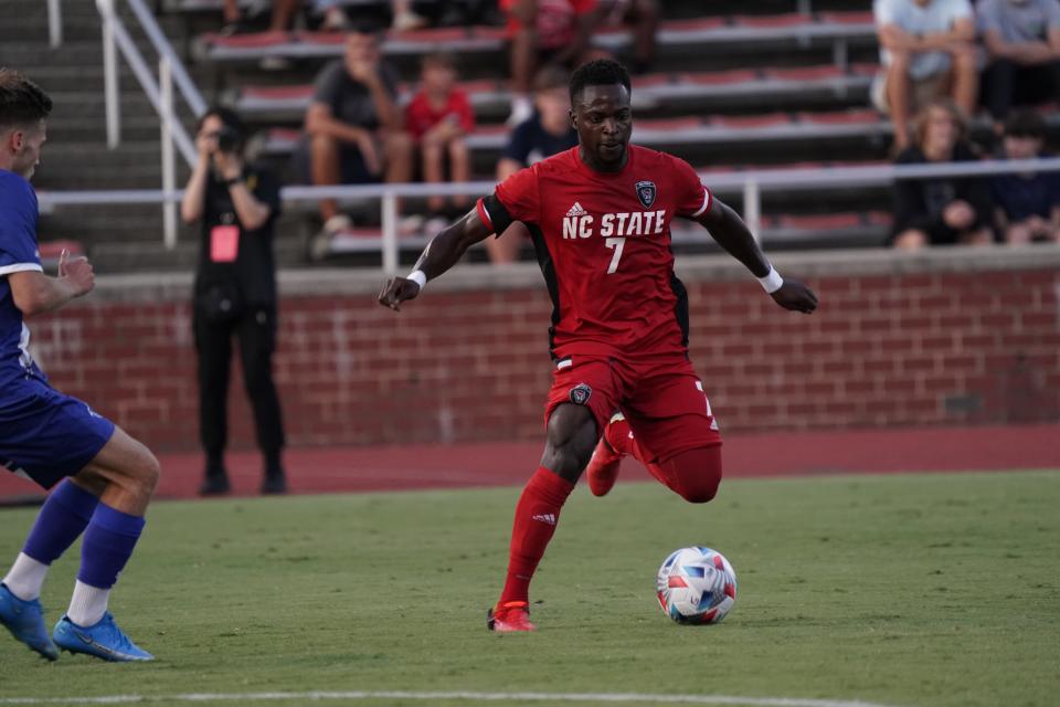 North Carolina State striker Ivy Brisma was born in Haiti, but calls East Windsor home.