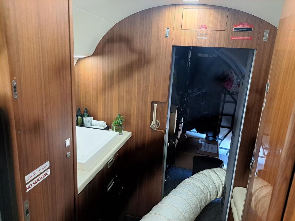 The private bedroom has its own bathroom, that's also connected to the cargo area at the aft of the plane.