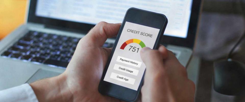 credit score concept on the screen of smartphone, checking payment history and ranking in bank