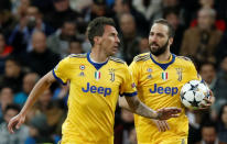 <p>Soccer Football – Champions League Quarter Final Second Leg – Real Madrid vs Juventus – Santiago Bernabeu, Madrid, Spain – April 11, 2018 Juventus’ Mario Mandzukic celebrates scoring their first goal with Gonzalo Higuain REUTERS/Paul Hanna </p>