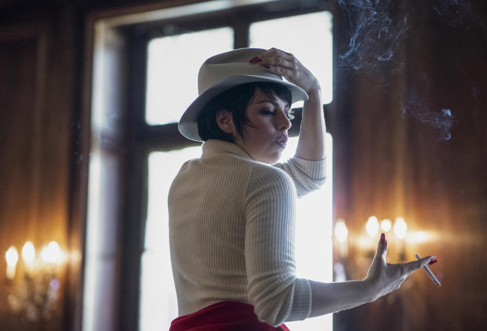 This image released by Netflix shows Krysta Rodriguez as Liza Minnelli in a scene from "Halston," premiering Friday. (Atsushi Nishijima/Netflix via AP)