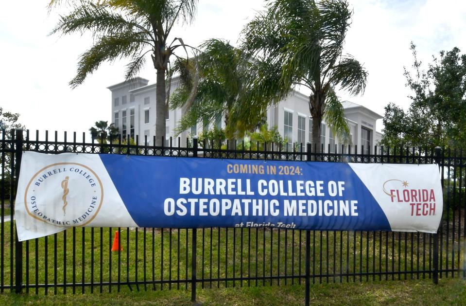 A banner at the intersection of Babcock Street and University Boulevard touts the Burrell College of Osteopathic Medicine's new Melbourne campus.