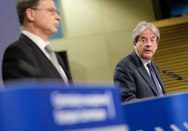 BRUSSELS, BELGIUM - MAY 18: EU Commissioner for An Economy That Works for People - Executive Vice President Valdis Dombrovskis (L) and the EU Commissioner for Economy Paolo Gentiloni (R) talk to the media in the Berlaymont, the EU Commission headquarter on May 18, 2021 in Brussels, Belgium. The European Commission has today adopted a Communication on Business Taxation for the XXI century to promote a robust, efficient and fair business tax system in the European Union. It sets out both a long-term and short-term vision to support Europe's recovery from the COVID-19 pandemic and to ensure adequate public revenues over the coming years. It aims to create an equitable and stable business environment, which can boost sustainable and job-rich growth in the EU and increase our open strategic autonomy. The Communication takes account of the progress made in the G20/OECD discussions on global tax reform. (Photo by Thierry Monasse/Getty Images) (Photo: Thierry Monasse via Getty Images)