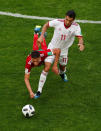 <p>Flying: Morocco’s Amine Harit goes to ground under pressure from Iran’s Vahid Amiri. REUTERS/Lee Smith </p>