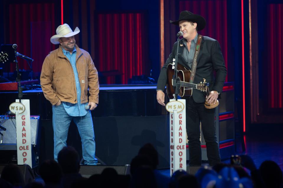 Jon Pardi, left, comments on his Grand Ole Opry induction by Garth Brooks.