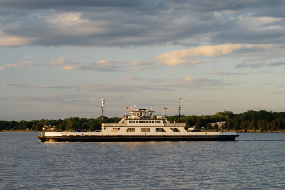 A Lake Champlain Transportation Company ferry transports boats between Grand Isle, Vermont and Plattsburgh, New York on June 7, 2020.