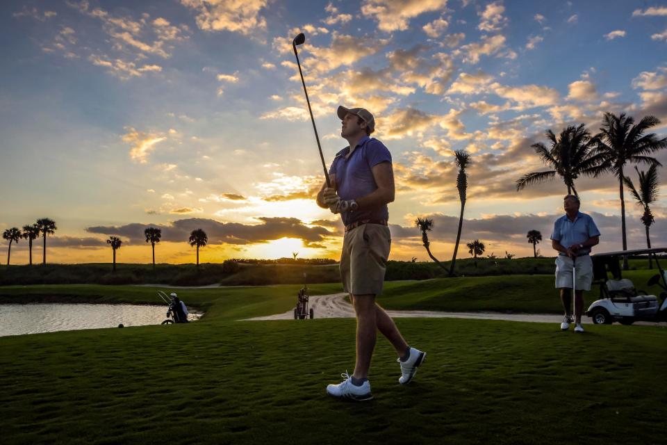 Mike McGrath of Palm Beach watches his ball after teeing off on the first hole of the Palm Beach Par 3 Golf Course.