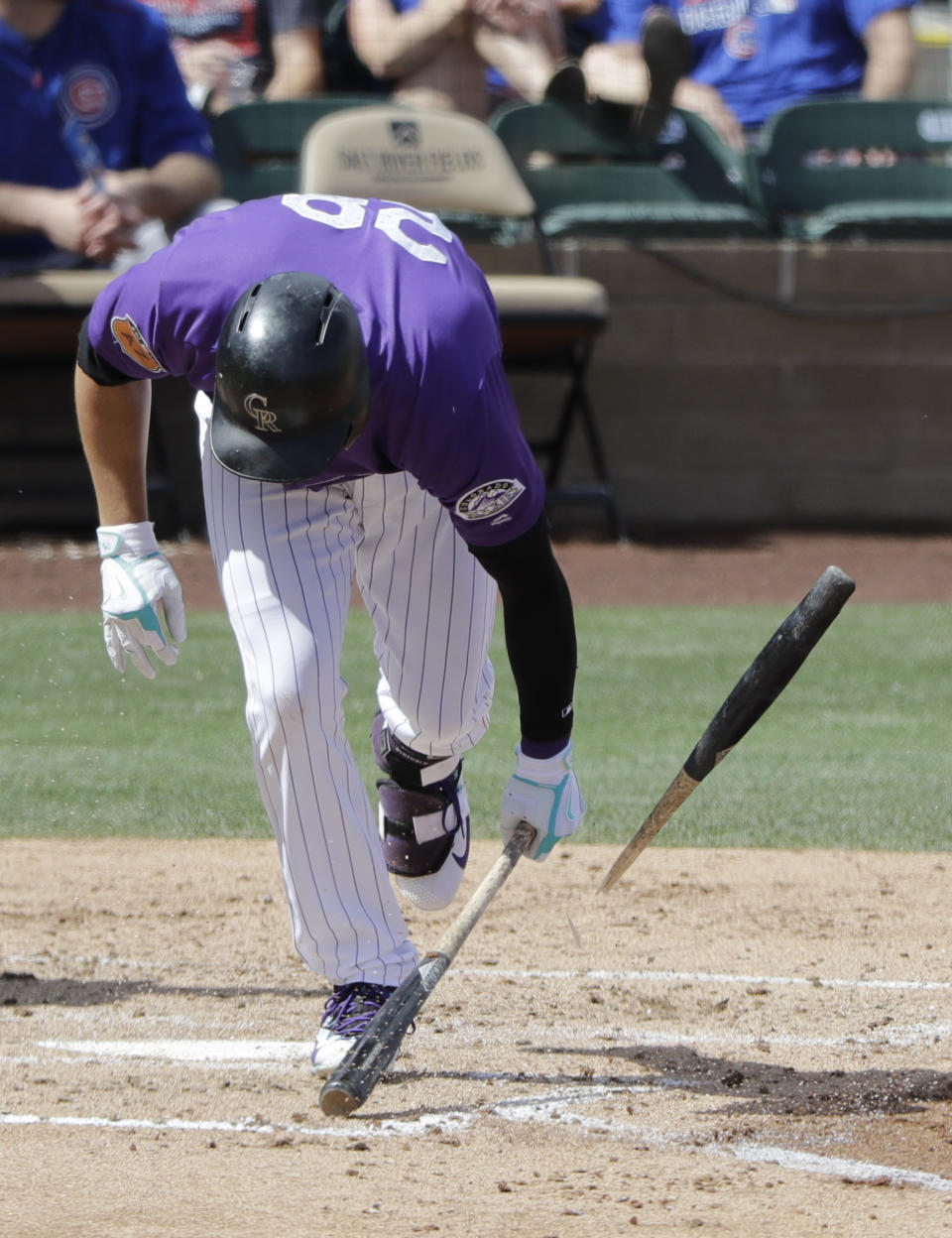 Colorado Rockies' Nolan Arenado breaks his bat after flying out during the third inning of a spring training baseball game against the Chicago Cubs, Saturday, March 25, 2017, in Scottsdale, Ariz. (AP Photo/Darron Cummings)