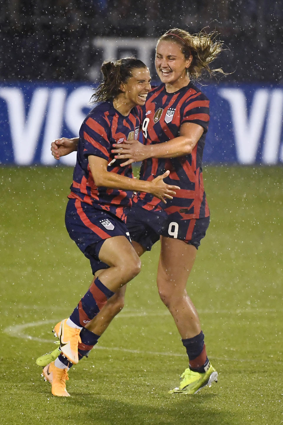 United States' Tobin Heath, left, celebrates her goal with Lindsey Horan during the second half of an international friendly soccer match against Mexico, Thursday, July 1, 2021, in East Hartford, Conn. (AP Photo/Jessica Hill)