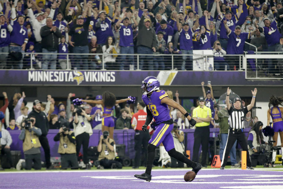 Minnesota Vikings wide receiver Justin Jefferson celebrates after catching a 6-yard touchdown pass during the first half of an NFL football game against the New England Patriots, Thursday, Nov. 24, 2022, in Minneapolis. (AP Photo/Andy Clayton-King)