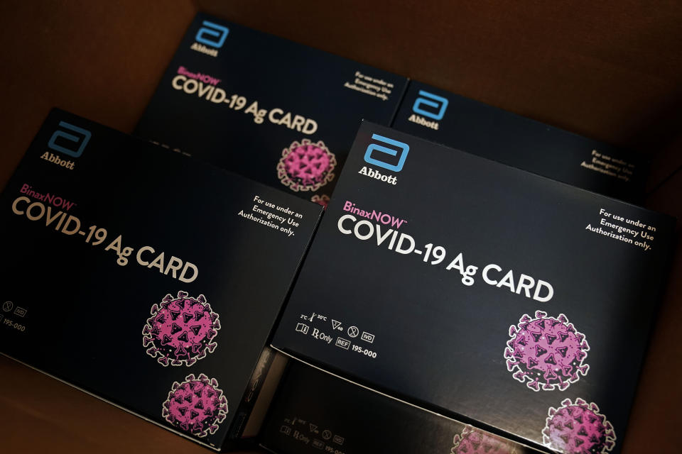 A box of coronavirus tests are ready for use in the student health center on campus at North Carolina Agricultural and Technical State University in Greensboro, N.C., Wednesday, Feb. 3, 2021. As vaccinations slowly ramp up, some experts say turning to millions more rapid tests that are cheaper but technically less accurate may improve the chances of identifying sick people during the critical early days of infection, when they are most contagious. (AP Photo/Gerry Broome)