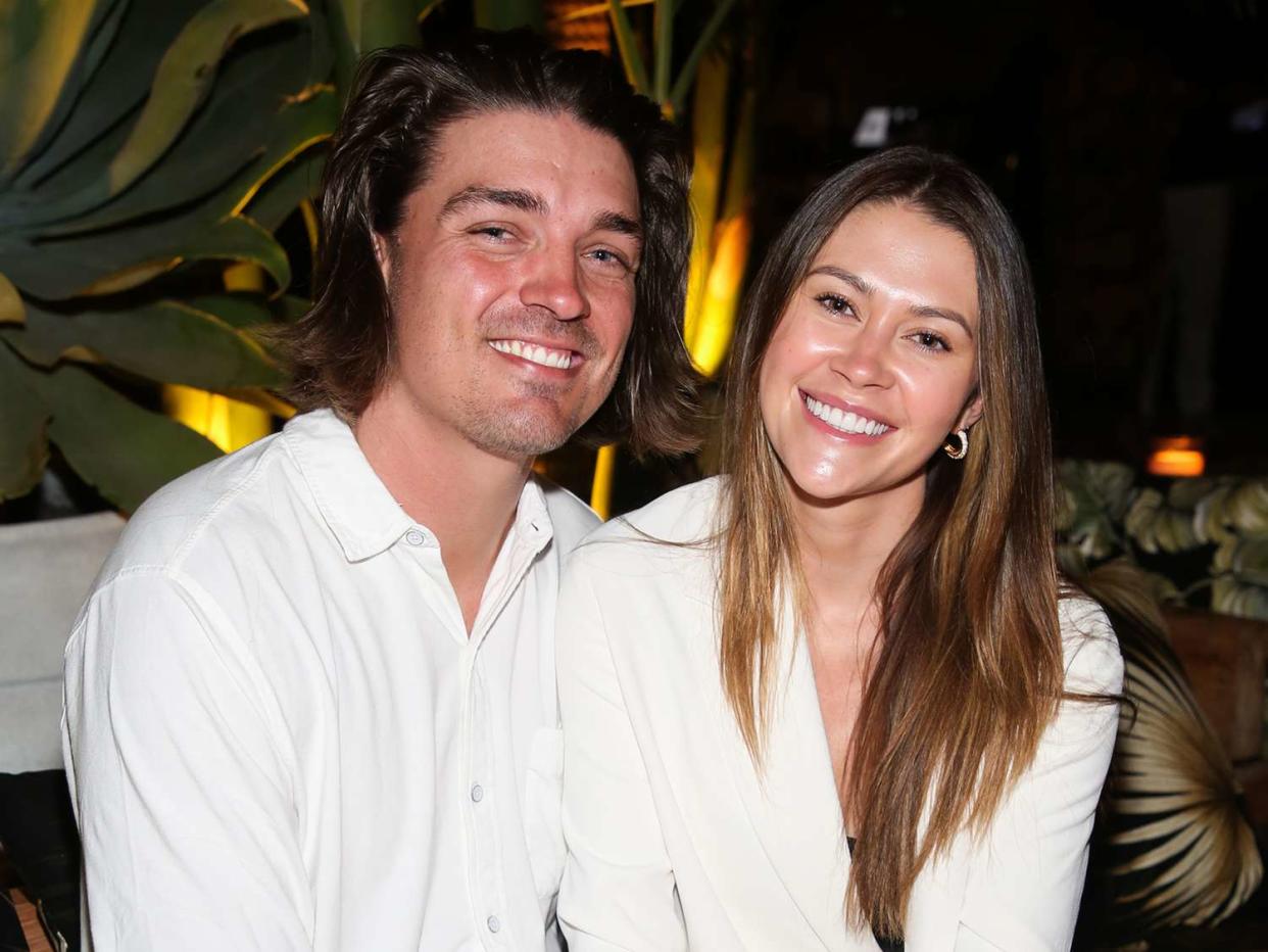 Dean Unglert (L) and Caelynn Miller-Keyes (R) attend the Belles Beach House opening at Belles Beach House on October 16, 2021 in Venice, California
