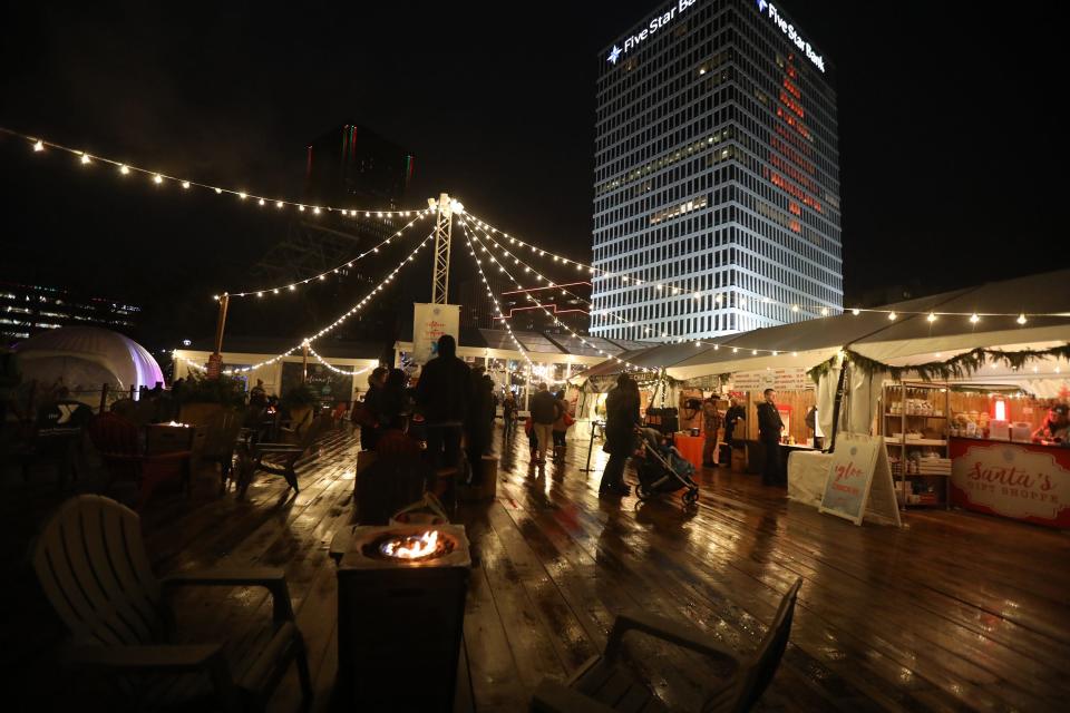  Roc Holiday Village in downtown Rochester, NY was busy Dec. 16, 2022, with people browsing the shops and taking advantage of the free ice skating.  