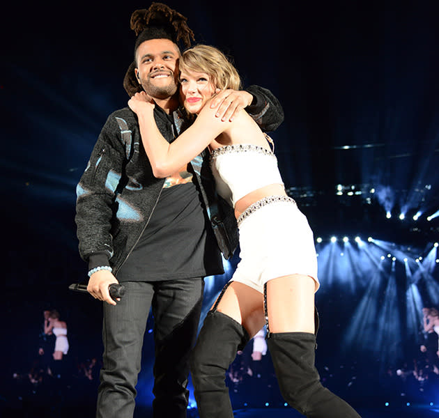 Taylor Swift performing with The Weeknd