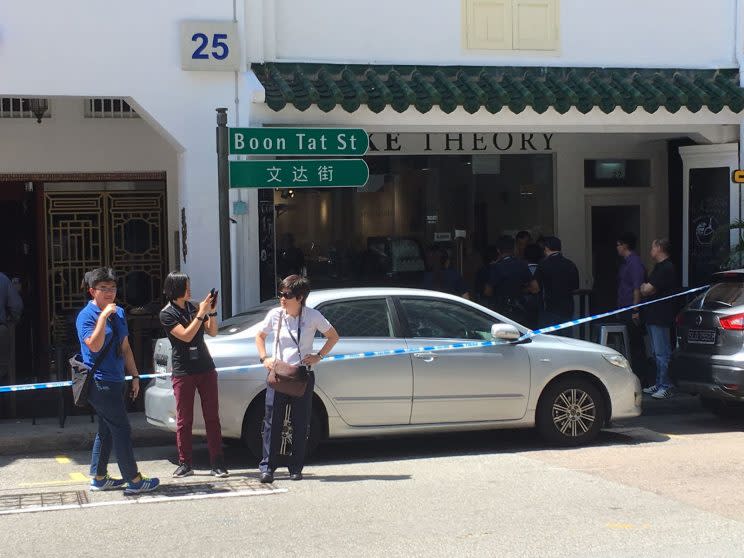 Police officers at the scene of the crime on 10 July 2017. Tan Nam Seng, now 72, pleaded guilty at the High Court on Thursday (20 August) to a charge of culpable homicide by repeatedly stabbing his son-in-law Spencer Tuppani, 38, on the chest with a knife, intending to cause his death. (Yahoo News Singapore file photo)