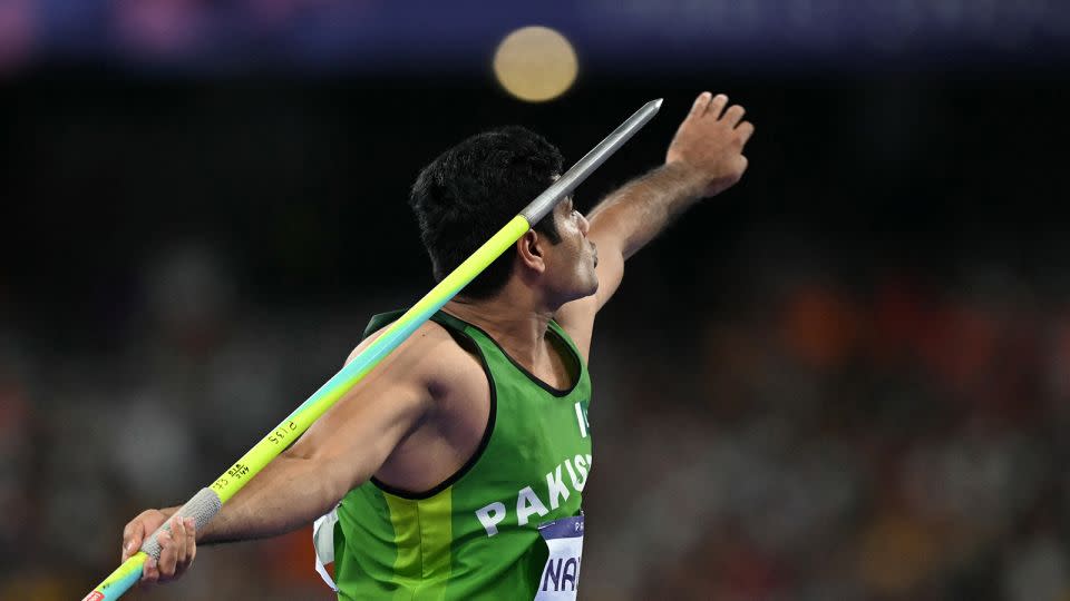 Pakistan's Arshad Nadeem competes in the men's javelin throw final of the athletics event at the Paris 2024 Olympic Games at Stade de France in Saint-Denis, north of Paris, on August 8, 2024. - Andrej Isakovic/AFP/Getty Images