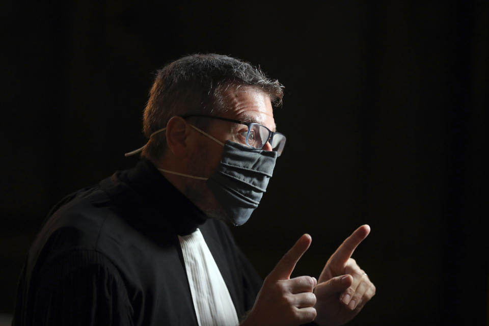 French lawyer Thibault de Montbrial, who is representing US soldiers who foiled a terror attack on an Amsterdam-Paris train in 2015, speaks to media on the opening day of the Thalys attack trial, at the Paris courthouse, Monday, Nov. 16, 2020. Islamic State operative Ayoub El Khazzani goes on trial Monday Nov. 16, 2020, in France on terror charges for appearing on a train with an arsenal of weapons and shooting one passenger in 2015. (AP Photo/Thibault Camus)