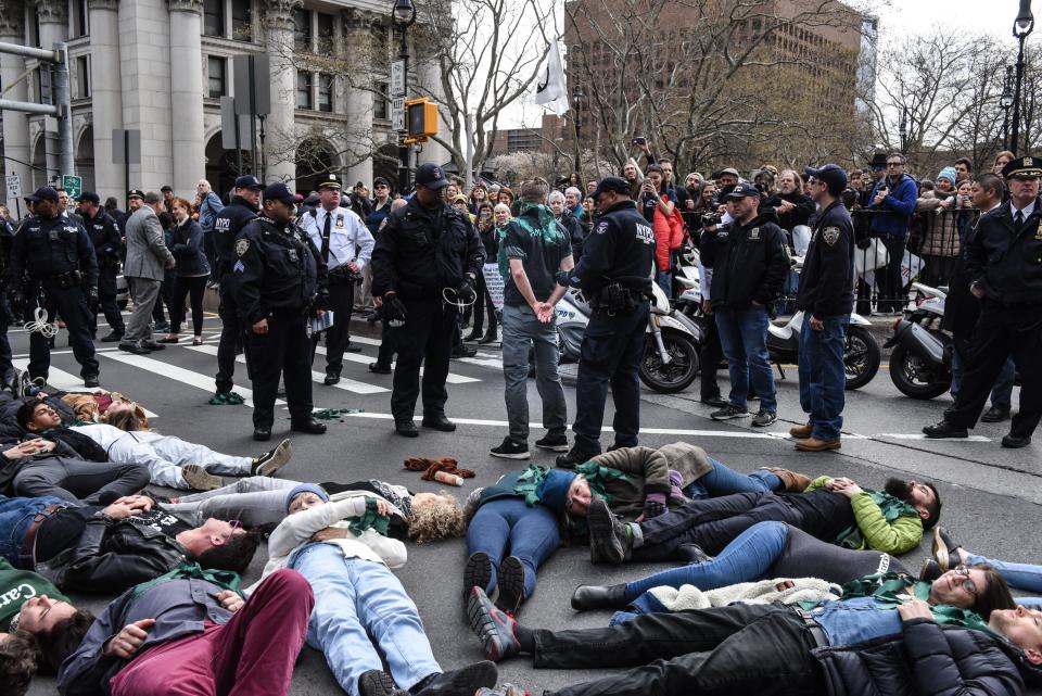 People participated in a direct action with a group protest organization called Extinction Rebellion on April 17, 2019, in New York City. The activists demanded governments declare a climate emergency to combat pollution.