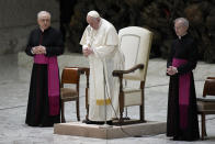 Pope Francis, center, attends the weekly general audience in the Paul VI Hall at the Vatican, Wednesday, Dec. 28, 2022. (AP Photo/Alessandra Tarantino)