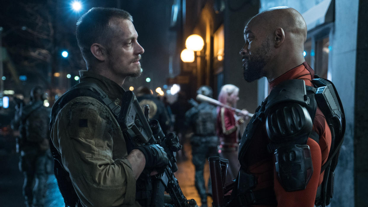 Joel Kinnaman and Will Smith in David Ayer's 2016 movie 'Suicide Squad'. (Credit: Warner Bros)