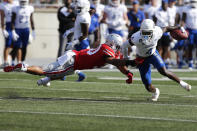 Ohio State linebacker Cody Simon, left, tries to tackle Tulsa receiver Josh Johnson during the first half of an NCAA college football game Saturday, Sept. 18, 2021, in Columbus, Ohio. (AP Photo/Jay LaPrete)