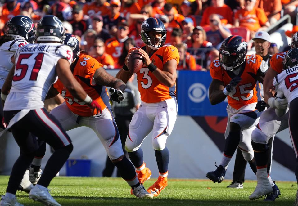 Denver Broncos quarterback Russell Wilson (3) prepares to pass in the third quarter against the Houston Texans at Empower Field at Mile High.