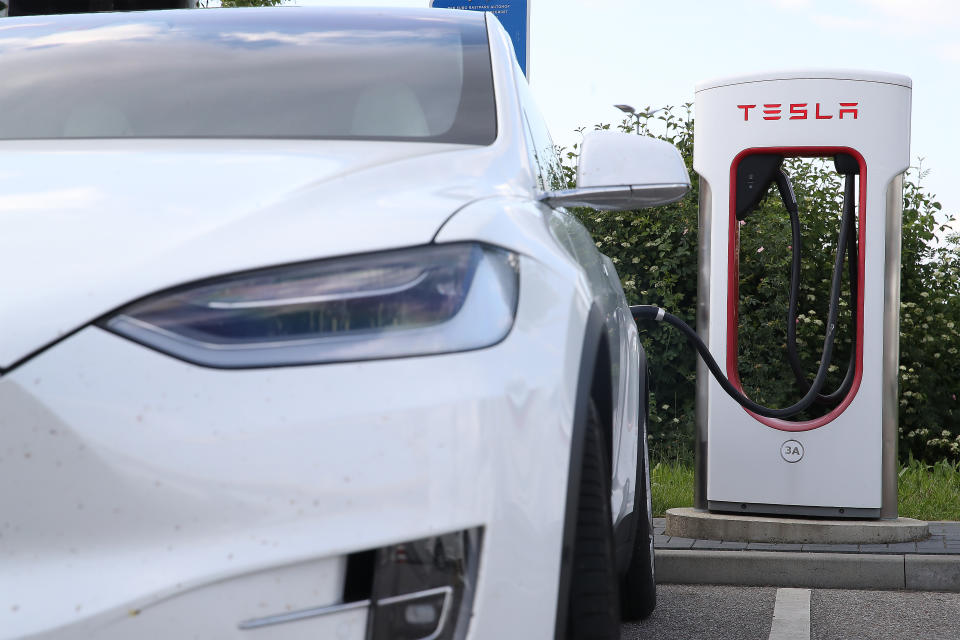 SCHWEITENKIRCHEN, GERMANY - MAY 26: Tesla cars charge at Tesla Superchargers at a rest stop on the A9 highway on May 26, 2020 at Schweitenkirchen, Germany. Tesla has expanded its network of Supercharger stations in Germany to 73 with another four currently under construction. (Photo by Alexander Hassenstein/Getty Images)